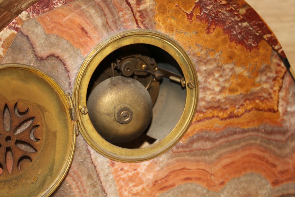 A French rouge marble mantel clock garniture